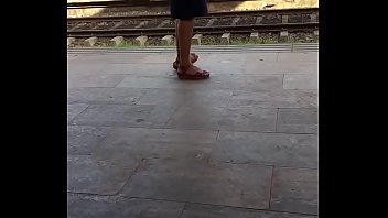 Hot legs in skirt waiting for train