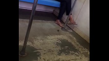 Young girl foot scratching in the train
