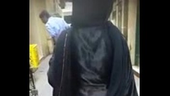 Muslim aunty in satin burka