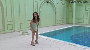 Sexiest petite teen Lizi Vogue swims naked in the pool