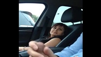 Petite hitchhiker gives her taxi driver a helping hand