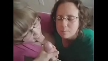 Two amateur blowjob chicks receive cum on their face and glasses