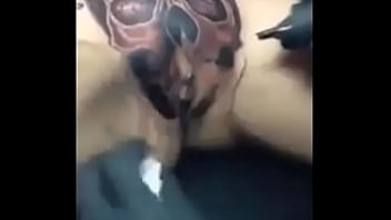 TEEN GETS A SKULL TATTOO ON HER PUSY